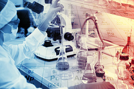 Researchers using lab equipment